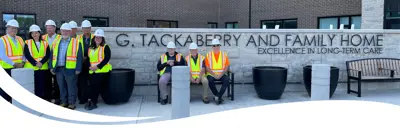 MPP Clark and County Councillors in front of the G. Tackaberry and Family Home
