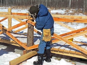 Boardwalk construction Volunteers building boardwalk in winter