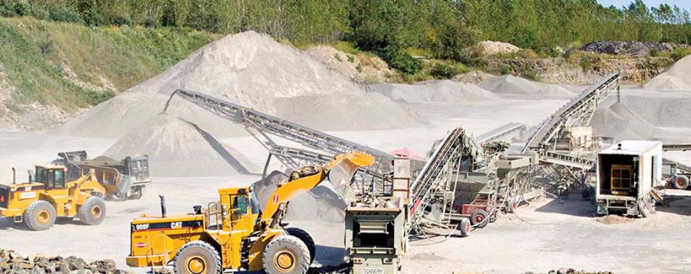Image of heavy equipment in a gravel pit